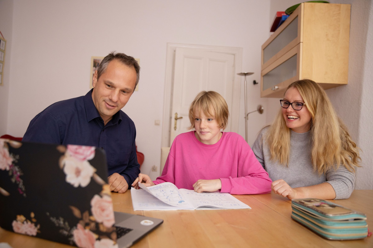 teen with parents computer